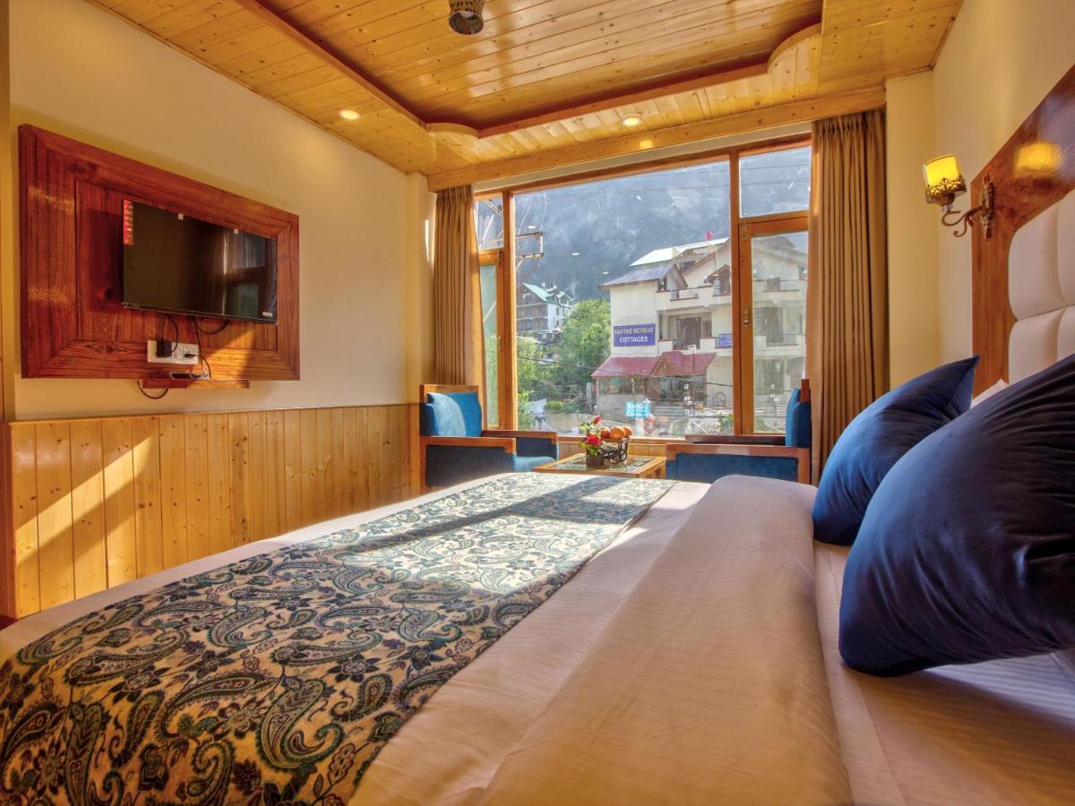 Отель Swastik Grand Manali Экстерьер фото